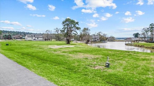 58 Wildwood Lake Dr, Huntsville, TX, 77340-1413 | Card Image