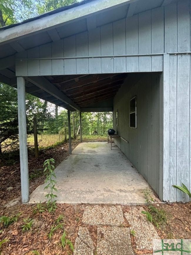 Carport - storage or grilling area | Image 21