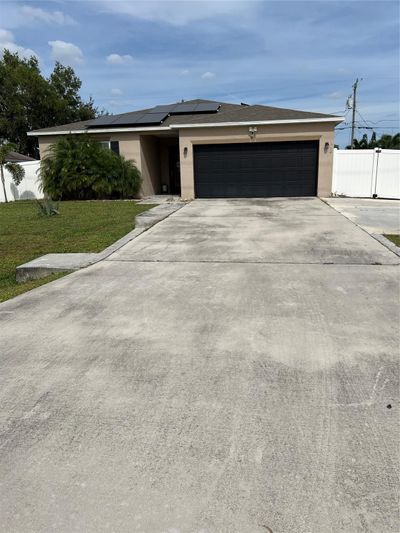 5278 Nw North Macedo Blvd, House other with 4 bedrooms, 2 bathrooms and null parking in Port St. Lucie FL | Image 1