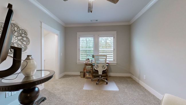Upstairs bedroom with private access to the Jack & Jill bath—each side has its own vanity, making mornings easier and more functional for everyone. | Image 50