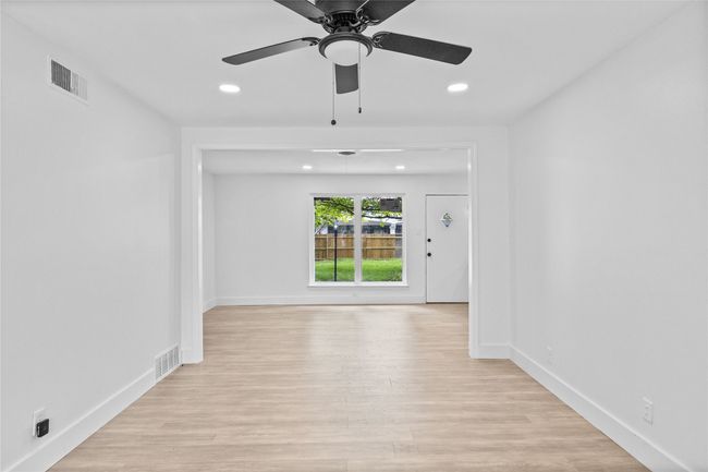 Unfurnished room featuring recessed lighting, light wood-style flooring, baseboards, and ceiling fan | Image 5