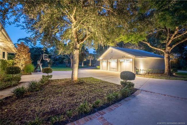5906 Ludlum St, House other with 5 bedrooms, 5 bathrooms and 3 parking in Palm City FL | Image 5