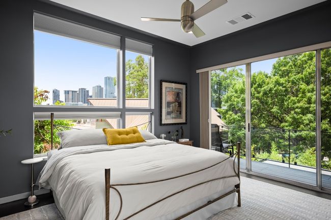 Treehouse level primary bedroom with the downtown Skyline as your headboard. | Image 4