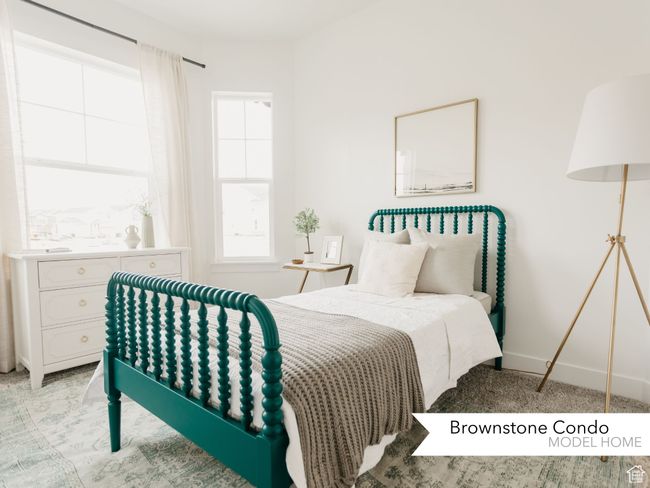 Bedroom with baseboards and light carpet | Image 11