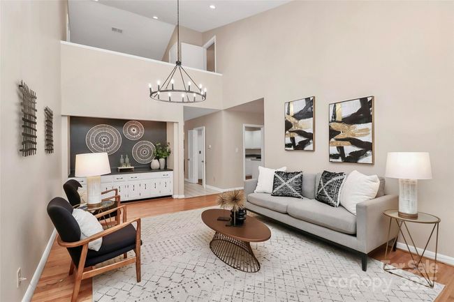 Great entertaining space in this vaulted great room with wet bar. | Image 5