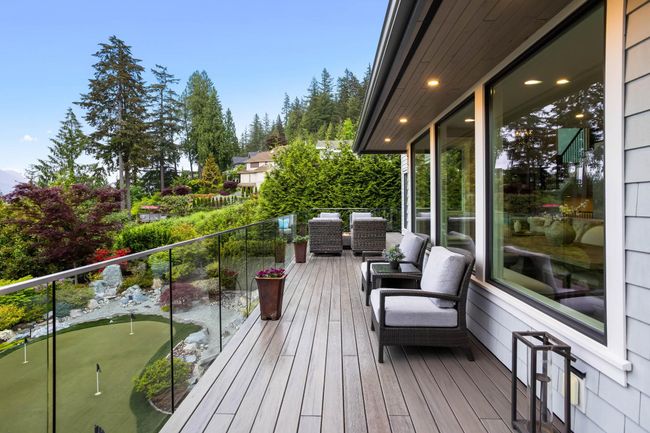 Wooden terrace featuring a putting green | Image 31