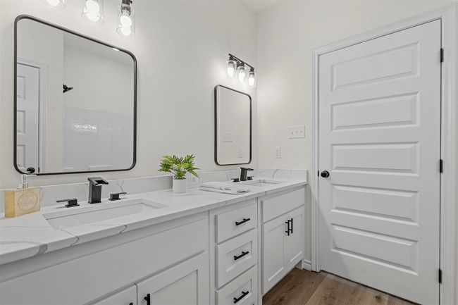 Bathroom with vanity and hardwood / wood-style floors | Image 36