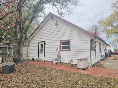 View of rear view of property with a brick patio | Image 3