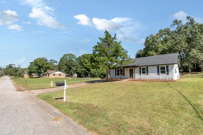 View of front of house with a front lawn and covered porch | Image 3