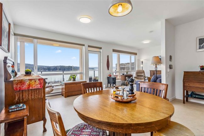 Dining space featuring a water view | Image 17