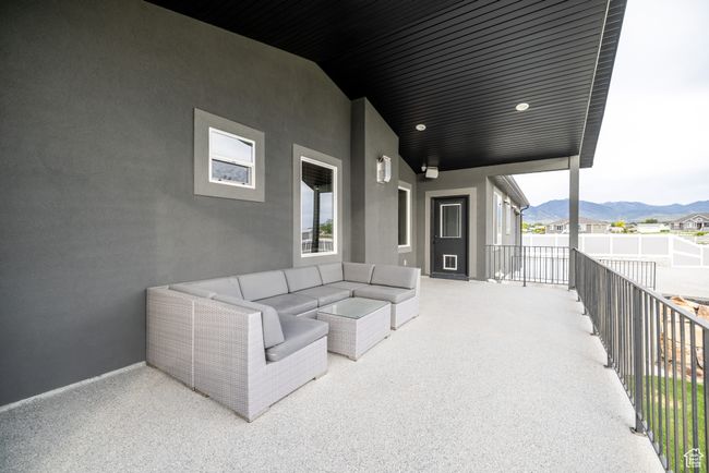 View of patio / terrace featuring a mountain view and an outdoor living space | Image 83