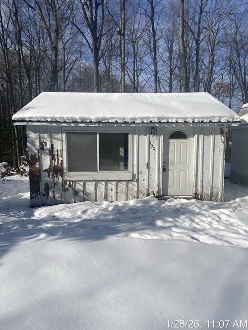 590 Wilson Road, Harrison, MI, 48625 | Card Image