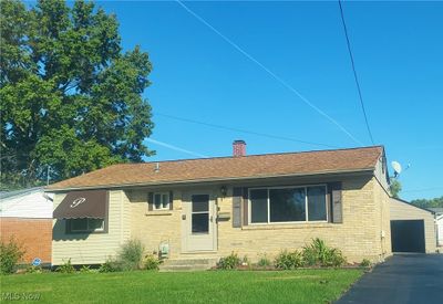 View of front of property featuring a front lawn | Image 1