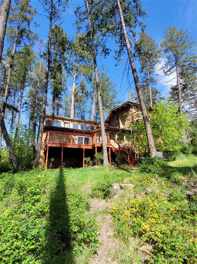 Rear view of house featuring a deck | Image 103