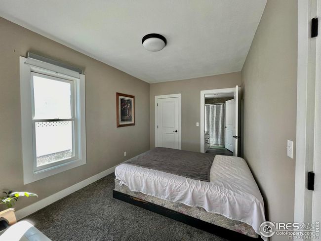 main level primary bedroom | Image 12