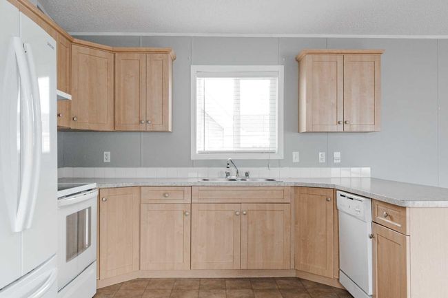 104 Grey Owl Place, House other with 3 bedrooms, 2 bathrooms and 2 parking in Fort Mcmurray AB | Image 11