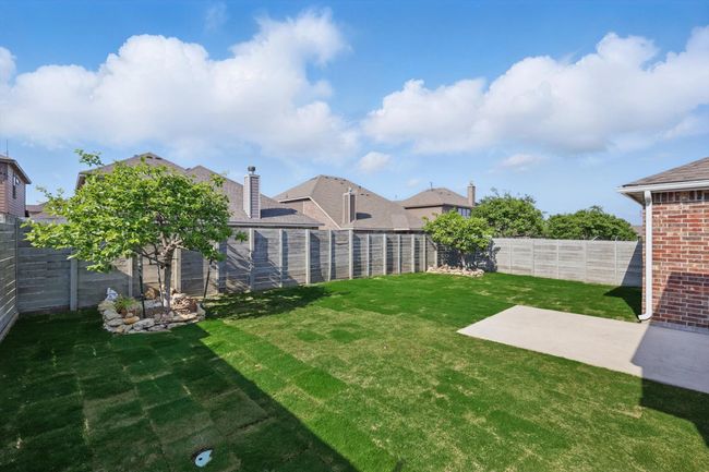 View of yard with a patio area and a fenced backyard | Image 37