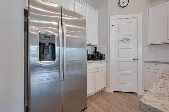 8619 Jetty Glen Dr, House other with 4 bedrooms, 3 bathrooms and 2 parking in Cypress TX | Image 8