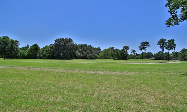 The Windrose golf course community also boasts walking trails, 20 acre lake fishing lake with pier, several playgrounds throughout, and several neighborhood clubs. | Image 45