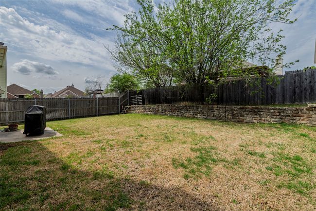 View of yard with a fenced backyard | Image 34