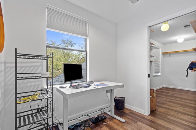 Office with dark hardwood / wood-style flooring | Image 18