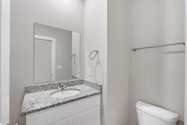 Bathroom with toilet and vanity | Image 17