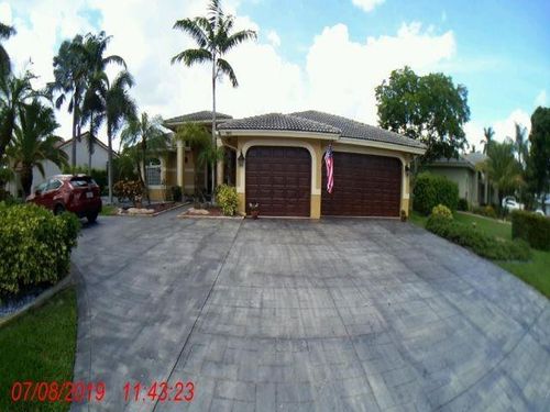 5062 Kensington Cir, Coral Springs, FL, 33076-2733 | Card Image