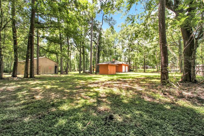 Dream big in this expansive backyard—offering endless possibilities for a pool, garden retreat, or even a guest house for multigenerational living. | Image 33