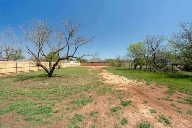 View of yard featuring a fenced backyard | Image 27