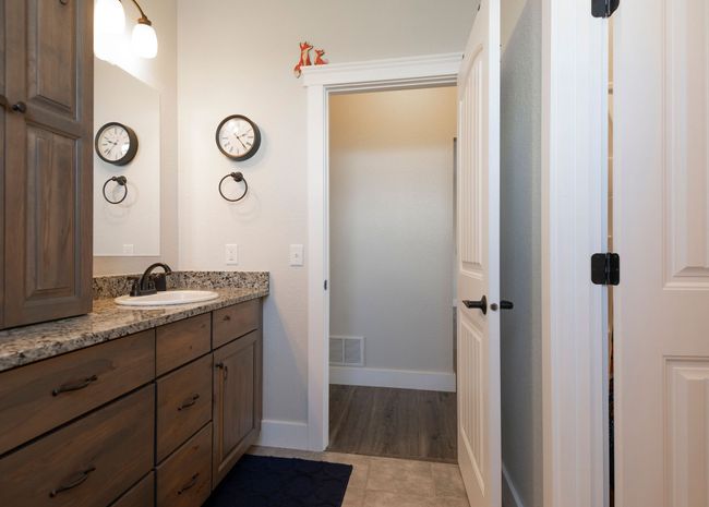 Bathroom with vanity and tile patterned flooring | Image 22