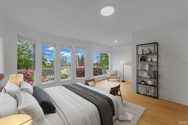 Bedroom featuring light wood finished floors, baseboards, and recessed lighting | Image 15