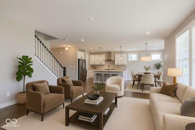 The floorplan is very open - offering a formal dining room, great room, office, an eat-in kitchen with bar and dining space, and an amazing outdoor living / grilling space - this is a one of a kind home! (virtually staged photo) | Image 8