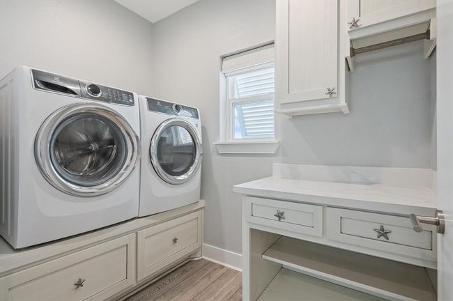 Laundry room with folding counter space | Image 43