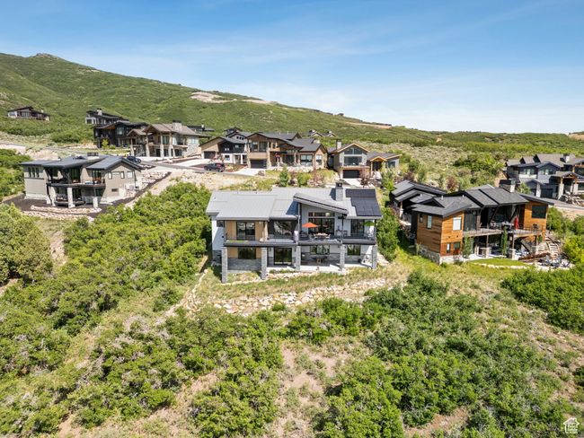 Aerial perspective of suburban area with a mountainous background | Image 10