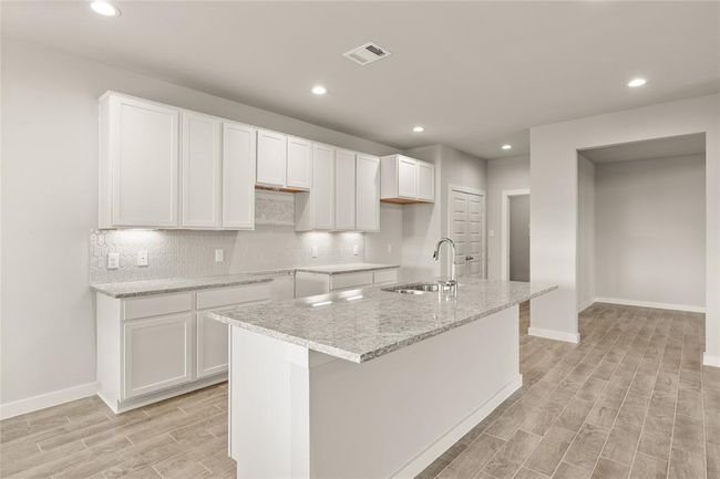 This photo is for illustrative purposes only and is not to be considered an exact replica of the finished home. Rendering does not match the finished product in terms of features, colors, landscaping, etc. Pricing, specifications, square footage and materials are subject to change at any time and without notice. | Image 5