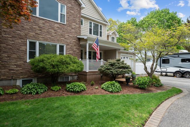 Deck featuring covered porch | Image 4