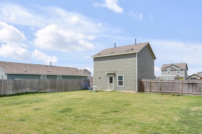 Rear view of property with a fenced backyard | Image 28