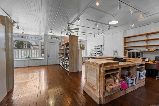 Sunlit Versatility: A Main Level Space for Business Brilliance or Family Bliss. | Image 16