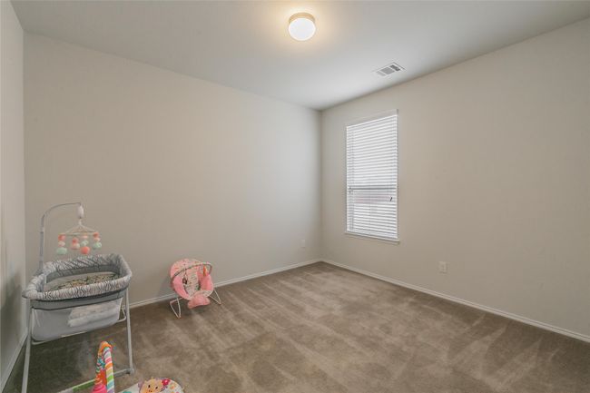 2nd bedroom featuring carpet | Image 11