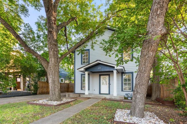 American foursquare style home featuring covered porch | Image 37