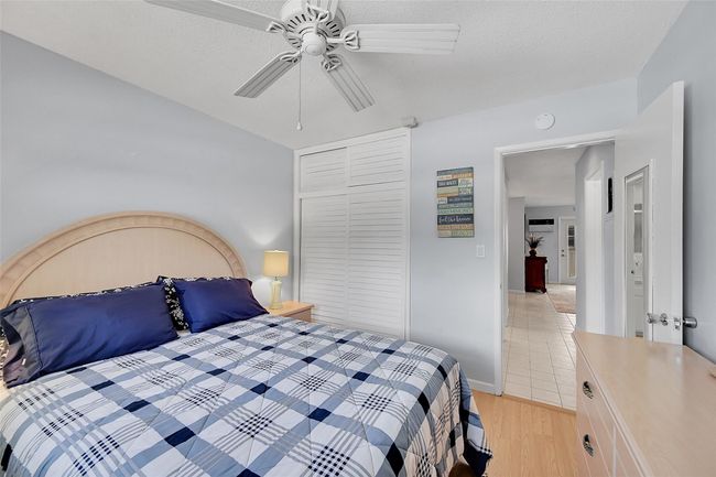 Guest Bedroom has Floor to Ceiling Closet Space with Seasonal Closet Storage at the Top. Bathroom is right outside the Bedroom. | Image 49
