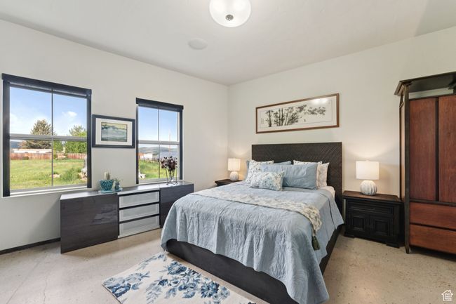 Bedroom featuring multiple windows and baseboards | Image 20