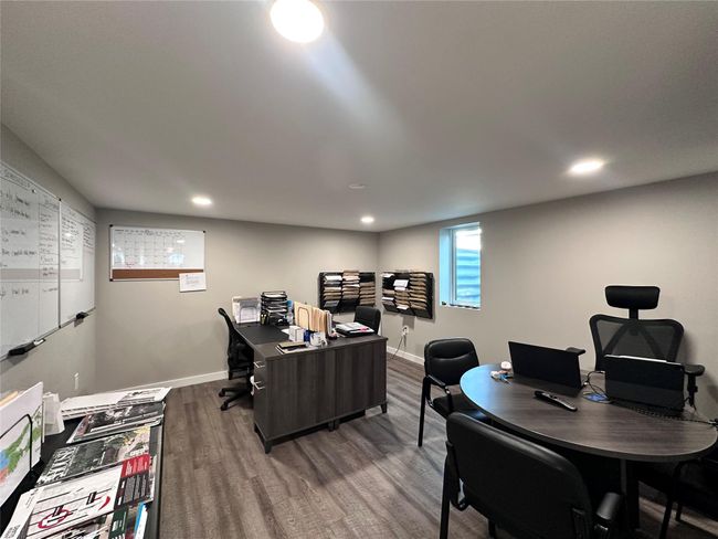 Office featuring wood finished floors and recessed lighting | Image 19