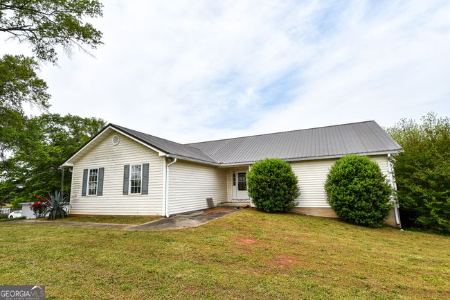 387 Fredonia Church Rd, Home with 3 bedrooms, 2 bathrooms and 2 parking in BARNESVILLE GA | Image 9