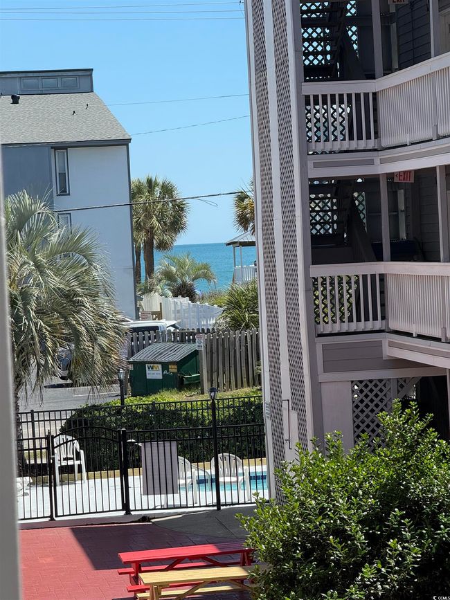 Enjoy a peek of the ocean from the balcony. | Image 27