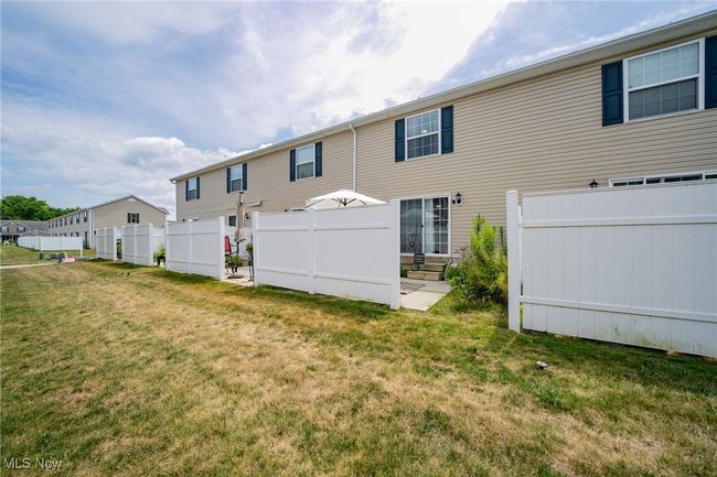 Rear view of house featuring a patio and a yard | Image 28