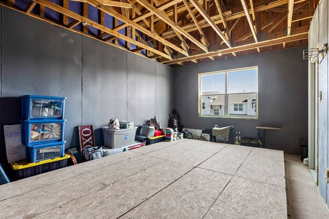 There is attic space for additional storage that could easily be transformed into a media room or extra bedroom. | Image 17