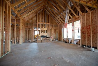 Miscellaneous room featuring high vaulted ceiling | Image 1