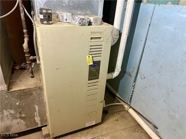 Utilities featuring heating unit | Image 31