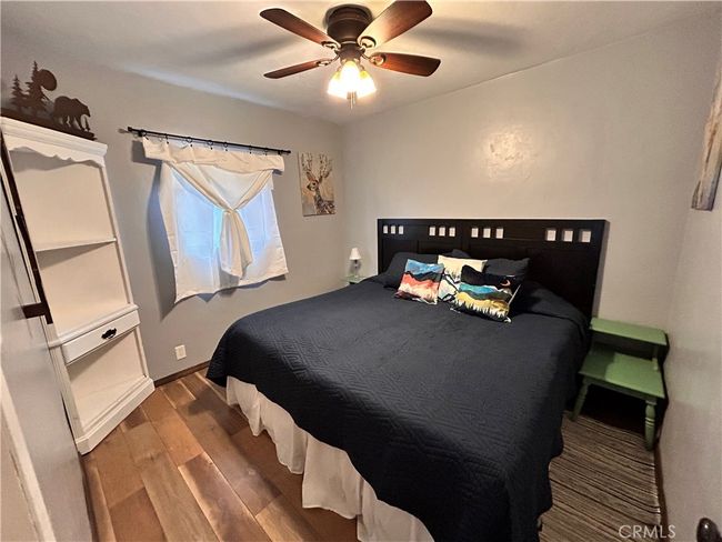 Bedroom featuring two twin beds pushed together | Image 14